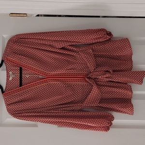 Red print v-neck blouse